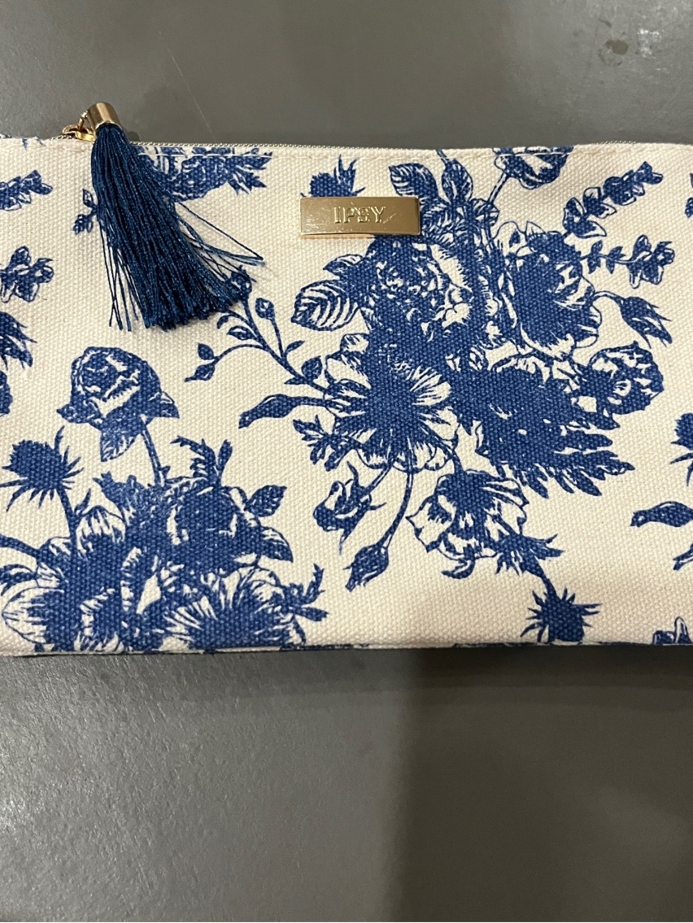 ipsy Cream and Blue Floral Canvas Clutch with Navy Tassel
